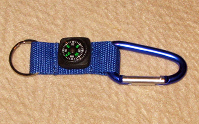 North Wing � Key Chain with Compass and North Wing logo